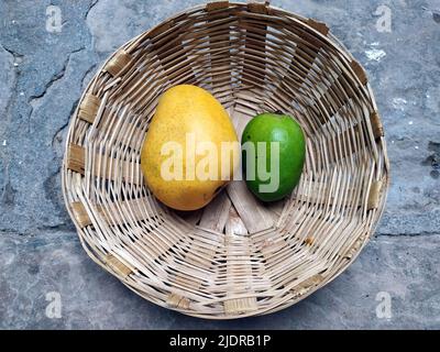 some fresh sweet fruits put in basket Stock Photo