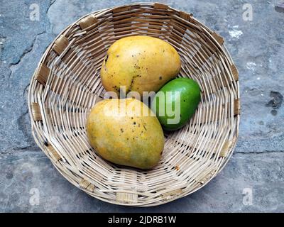 some fresh sweet fruits put in basket Stock Photo