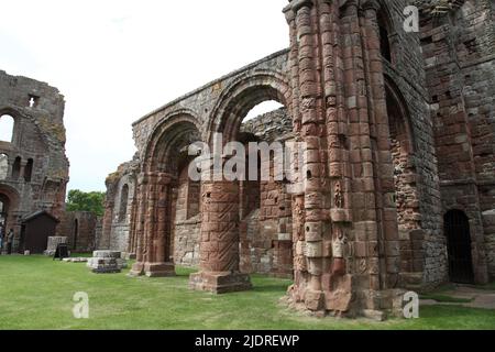 Ruins of Lindisfarne Priory on Holy Island, Northumberland, founded by the Irish monk St.Aidan in AD635. Stock Photo