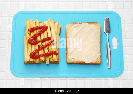 chip butty (french fry sandwich), British food Stock Photo