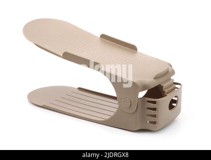 Adjustable plastic storage shoes rack holder isolated on white Stock Photo