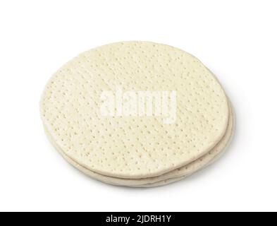 Three uncooked frozen pizza dough bases isolated on white Stock Photo