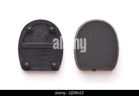 Top view of black replacement shoe heel pieces set isolated on white Stock Photo