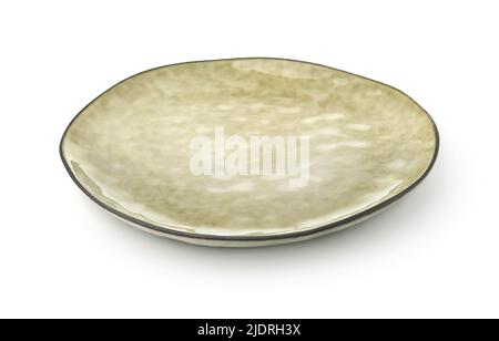 Empty rough trendy handmade ceramic plate isolated on white Stock Photo