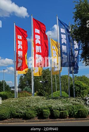 IKEA flags flying in the summer sun, Warrington store at 910 Europa Blvd, Westbrook, Warrington WA5 7TY Stock Photo