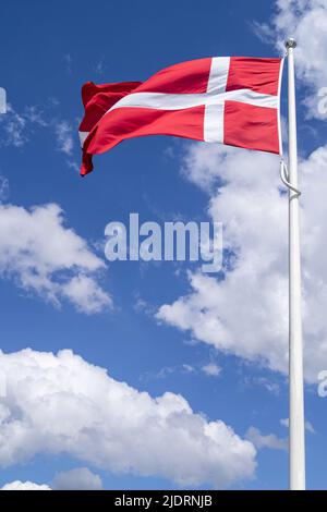 flag of Denmark flying in the wind Stock Photo