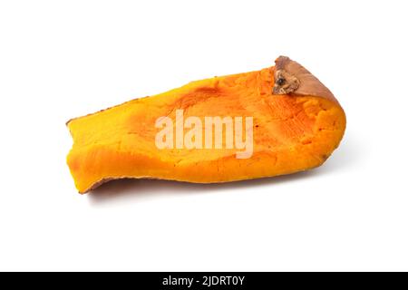 Slice of oven roasted pumpkin on a white background Stock Photo