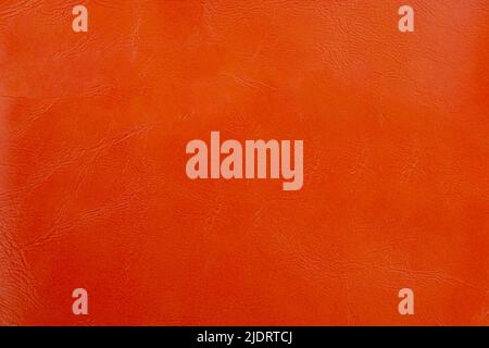 Background image - leather texture in orange color. Stock Photo