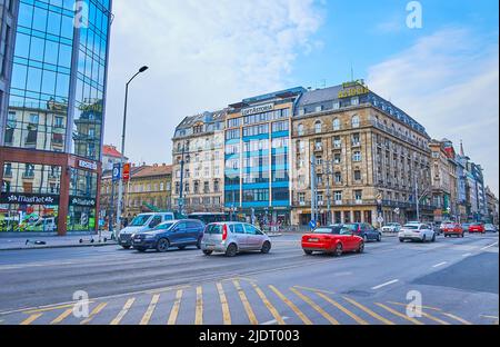 BUDAPEST, HUNGARY - FEB 27, 2022: The fast traffic on Lajos Kossuth Street with a view on Hotel Astoria in background, on Feb 27 in Budapest Stock Photo