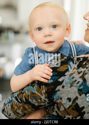 Close-up of mother holding baby son (12-17 months) Stock Photo