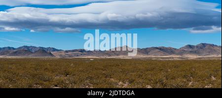 USA, New Mexico, Cuchillo, Clouds over desert landscape in Gila National Forest Stock Photo