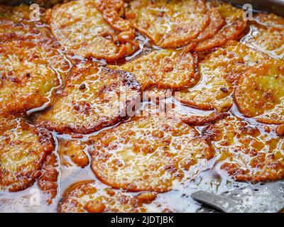 Indian Traditional Sweet Named Malpua Cooking in Hot Oil in Kadai (Frying  Pan). This Delicious Dessert is Famous in Ajmer - Rajasthan, India. Stock  Photo