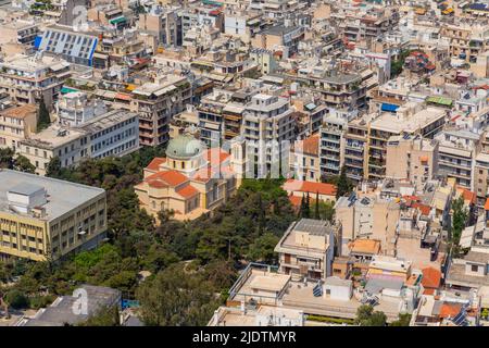 ATHENS, GREECE - MAY 06 2022: Dense living and architecture in Athens, Greece. Residential district with a lot of houses and real estate in the South Stock Photo