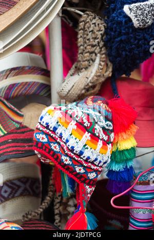 Multiple styles of peruvian hats at a local market in Cusco, Peru. Stock Photo