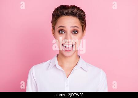 Photo of impressed blond millennial lady wear white shirt isolated on pink color background Stock Photo