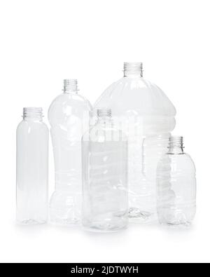 Many empty plastic bottles isolated on white Stock Photo - Alamy