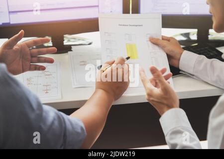 Programmers team working in a software developing. Developing programming and coding technologies. Website design. Cyber space concept. Stock Photo