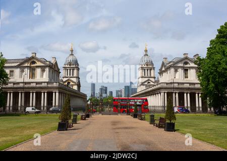 London, UK - May 13, 2022: General view of the Grenwich area from the Queen's house, with the Naval university and the Canary wharf skyline in the bac Stock Photo
