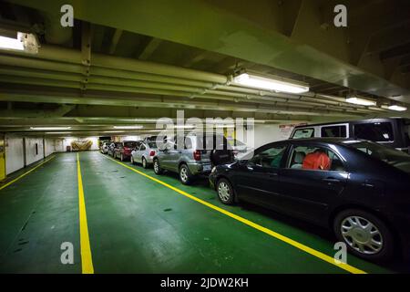 Caribou, Nova Scotia - Cars waiting for disembarking at the arrival ferry terminal. Northumberland Ferry service operates from PEI to NS daily trips Stock Photo