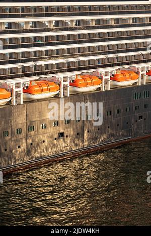 The lifeboats of luxury cruise ship Holland America Line 'MS Westerdam' in harbour at Kiel, Schleswig-Holstein, Germany Stock Photo