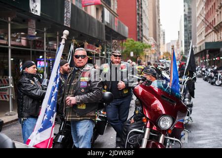Manhattan, USA - 11. November 2021: Veterans Day Biker group Vets. Honoring Veterans. Motorcycle riders in Manhattan