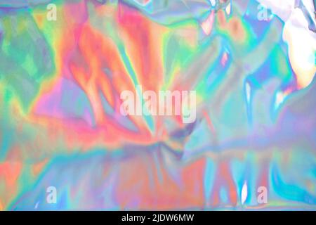 Colorful folia holographic background. Futuristic blurred template. Neon pastel, hologram and rainbow colors. Abstract gradient. Stock Photo