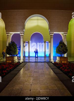 LIMA, PERU - CIRCA SEPTEMBER 2019: Visitors talking a selfie in the  Park  of the Reserve 'Circuito Magico del Agua' in Lima at night. The magic water Stock Photo