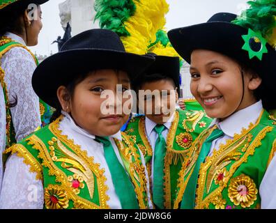 LIMA, PERU - CIRCA SEPTEMBER 2019: Portrait of Peruvian kids during a typical celebration in the Square San Martin in Lima, Peru. Stock Photo