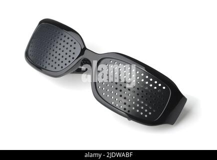Folded black plastic  pinhole eyeglasses isolated on white Stock Photo