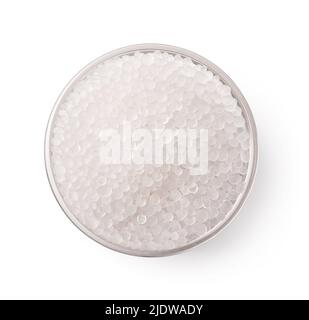 Top view of glass bowl of silica gel granules isolated on white Stock Photo