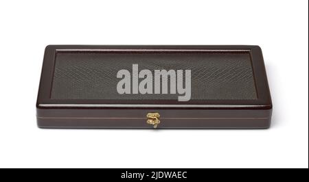 Front view of closed board game case made of wood and leather isolated on white Stock Photo