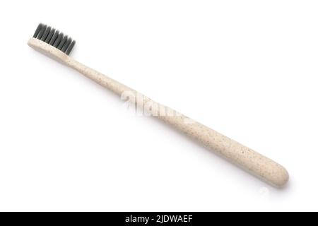 Eco-friendly biodegradable toothbrush isolated on white Stock Photo