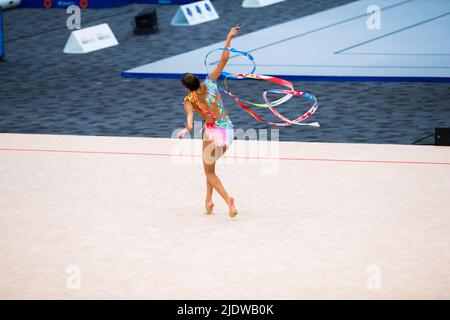 Australian Senior International Rhythmic Gymnast, Ashari Gill, starting  pose of a hoop routine during 2022 Oceania Rhythmic Gymnastics Continental  Championships. The event was running in parallel with Australian Gymnastics  Championships on Gold