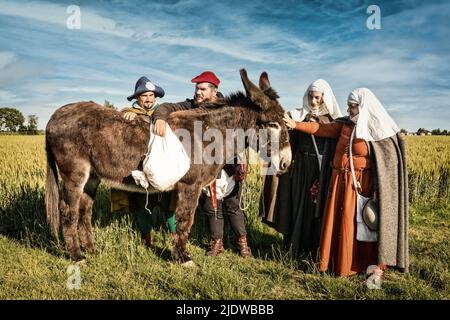 Ferrara, Italy. 30th May, 2021. Italy, XIV Century, pilgrims traveling to Rome with the donkey Credit: Independent Photo Agency/Alamy Live News Stock Photo