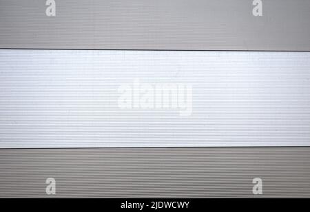 corrugated iron wall, Grey metal structure pattern on a wall Stock Photo