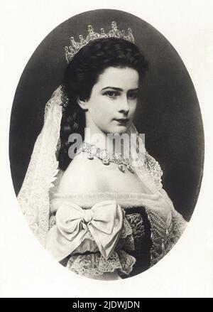 1867 ca.  , Budapest , Hungary    : The celebrated austrian  Empress Elisabeth of HABSBURG   ( SISSI von Wittelsbach  , 1937 - 1898 ) with crown of Queen of Hungary , daughter of Maximillian von Bayern, wife of  Kaiser Franz Josef ( 1830 - 1916 ) , Emperor of Austria , King of Hungary and Bohemia . Mother of suicided prince Rudolf ( 1850 - 1889 ). The Empress was killed by the italian anarchist Luigi Luccheni in Geneva  - FRANCESCO GIUSEPPE - JOSEPH - ABSBURG - ASBURG - ASBURGO - NOBILITY - NOBILI - NOBILTA' - REALI  - HASBURG - ROYALTY - ELISABETTA DI BAVIERA  - UNGHERIA - triste - sad - tris Stock Photo