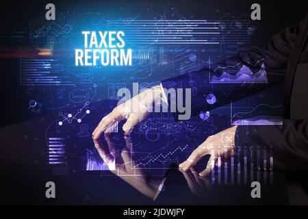 Businessman touching huge screen concept Stock Photo