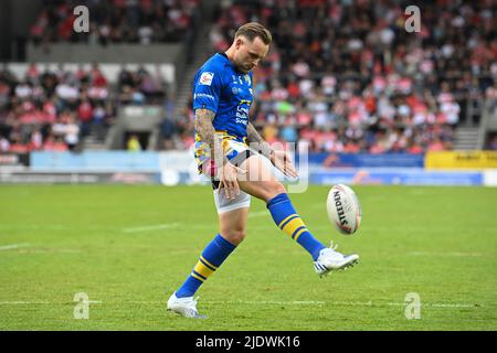 Blake Austin (6) of Leeds Rhinos kicks the ball during pre match warm up Stock Photo