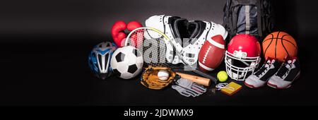 Close-up Of Various Sport Equipment Isolated On Black Background Stock Photo