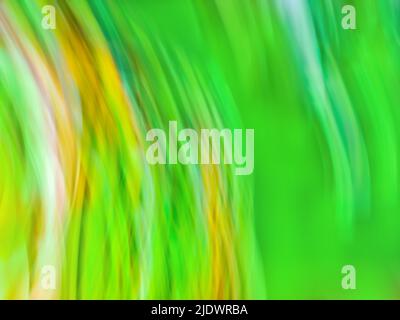 Zoomed abstract green background with radial radiating lines. Abstract green image of  light zoom trails. Stock Photo