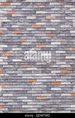 Decorative stone. Multicolored decorative stone wall pattern. Vertical background image Stock Photo
