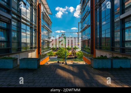 View between apartment buildings onto vintage ships, Kiel Week 2022, Germania Hafen, habor for tall ships, Kiel, Schleswig-Holstein, Northern Germany Stock Photo