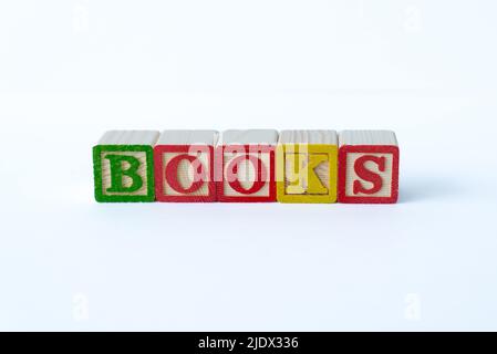 The word Books spelled with colorful toy blocks on a white background Stock Photo