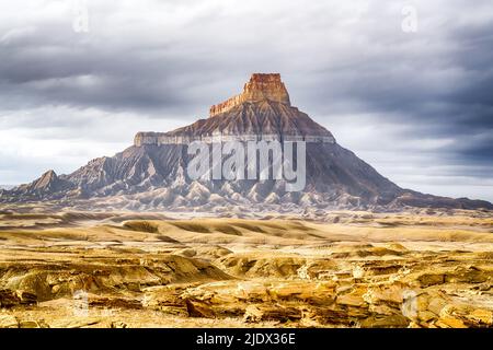 Factory Butte in the Caineville Badlands of Utah Stock Photo