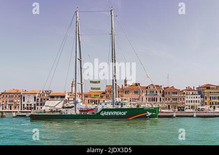 Venice, ITALY MAY 12, 2022 -The Rainbow Worrior, the ship of greenpeace activists, has docked in front of Venice Stock Photo