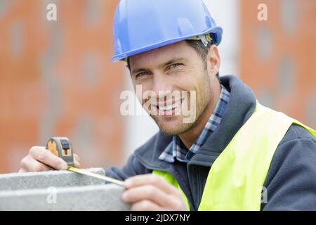 worker fixing steel rebar at building site Stock Photo