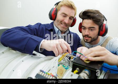 electrician engineer worker with cables Stock Photo