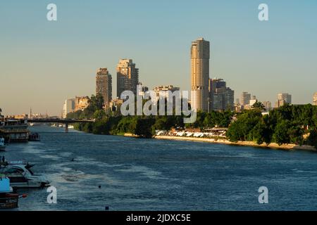 Egypt, Cairo, River Nile at dusk with Zamalek skyline in background Stock Photo