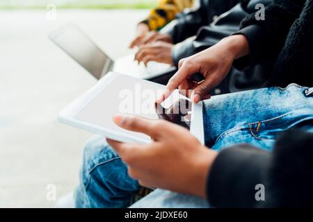 Hands of man using tablet PC Stock Photo