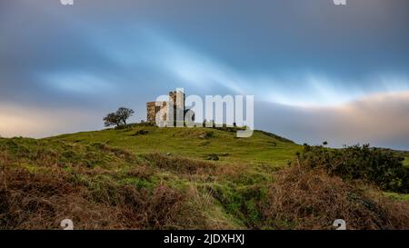 UK, England, Brentor, Cloudy sky over secluded Brentor Church Stock Photo